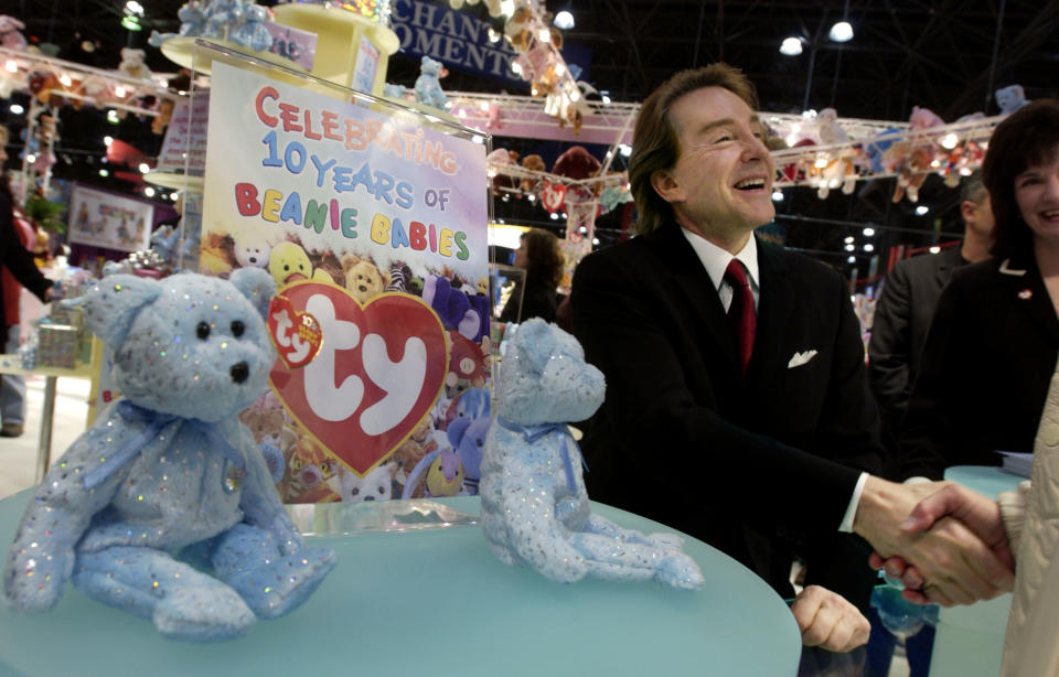 NEW YORK - FEBRUARY 16:  Ty Warner, creator of Beanie Babies toys, shakes hands in a rare appearance to celebrate the 10th anniversary of the Beanie Babies toy line at the American International Toy Fair February 16, 2003 at the Jacob K. Javits Convention Center in New York City.  The Toy Fair, a New York institution in February for 100 years, continues through February 20.   (Photo by Chris Hondros/Getty Images)