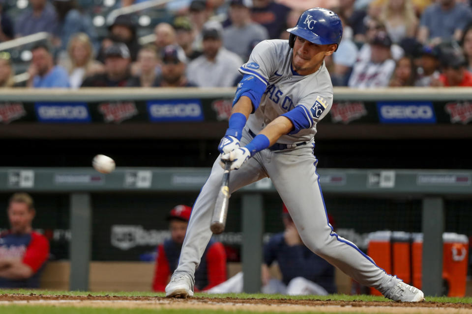 Kansas City Royals' Nicky Lopez hits an RBI single against the Minnesota Twins during the fourth inning of a baseball game Friday, May 27, 2022, in Minneapolis. (AP Photo/Bruce Kluckhohn)