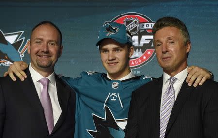 June 23, 2017; Chicago, IL, USA; Joshua Norris poses for photos after being selected as the number nineteen overall pick to the San Jose Sharks in the first round of the 2017 NHL Draft at the United Center. Mandatory Credit: David Banks-USA TODAY Sports