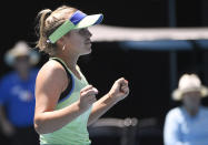 Sofia Kenin of the U.S. celebrates her win over Tunisia's Ons Jabeur in their quarterfinal match at the Australian Open tennis championship in Melbourne, Australia, Tuesday, Jan. 28, 2020. (AP Photo/Andy Brownbill)