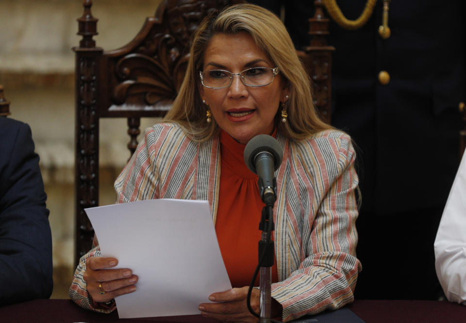 Bolivia's interim President Jeanine Anez speaks during a press conference at the presidential palace, in La Paz, Bolivia, Thursday, Nov. 28, 2019. Anez reported today that she has determined to repeal Decree 4078, which authorized the military to participate in public restoration operations without having criminal responsibility for the use of force in situations of need and defense. (AP Photo/Juan Karita)