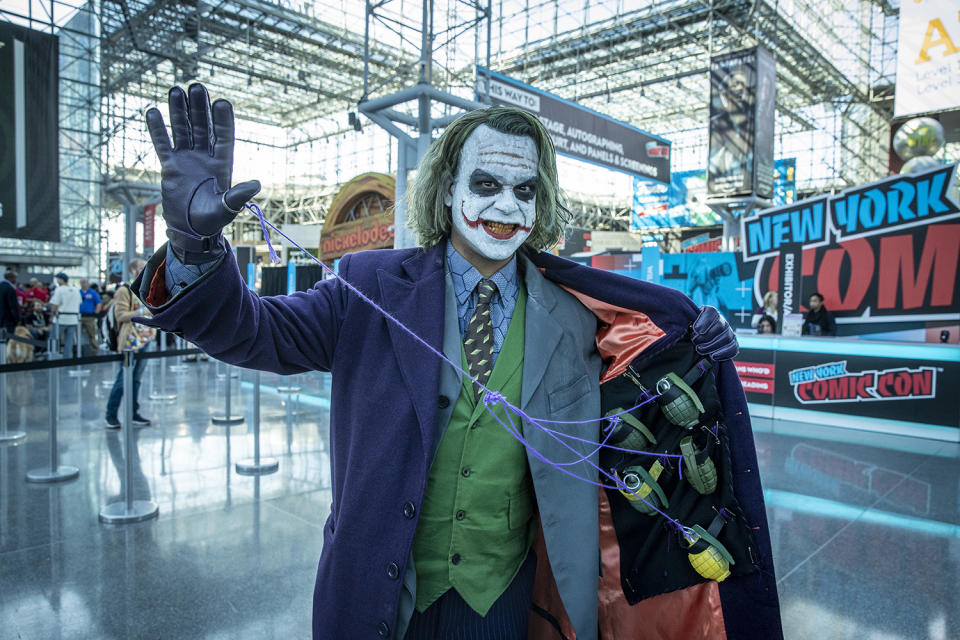 A cosplayer dressed as The Joker looks prepared to pull strings attends the New York Comic Con 2019  at Jacob Javits Center on Oct. 5, 2019 in New York City. (Photo: Gordon Donovan/Yahoo News)