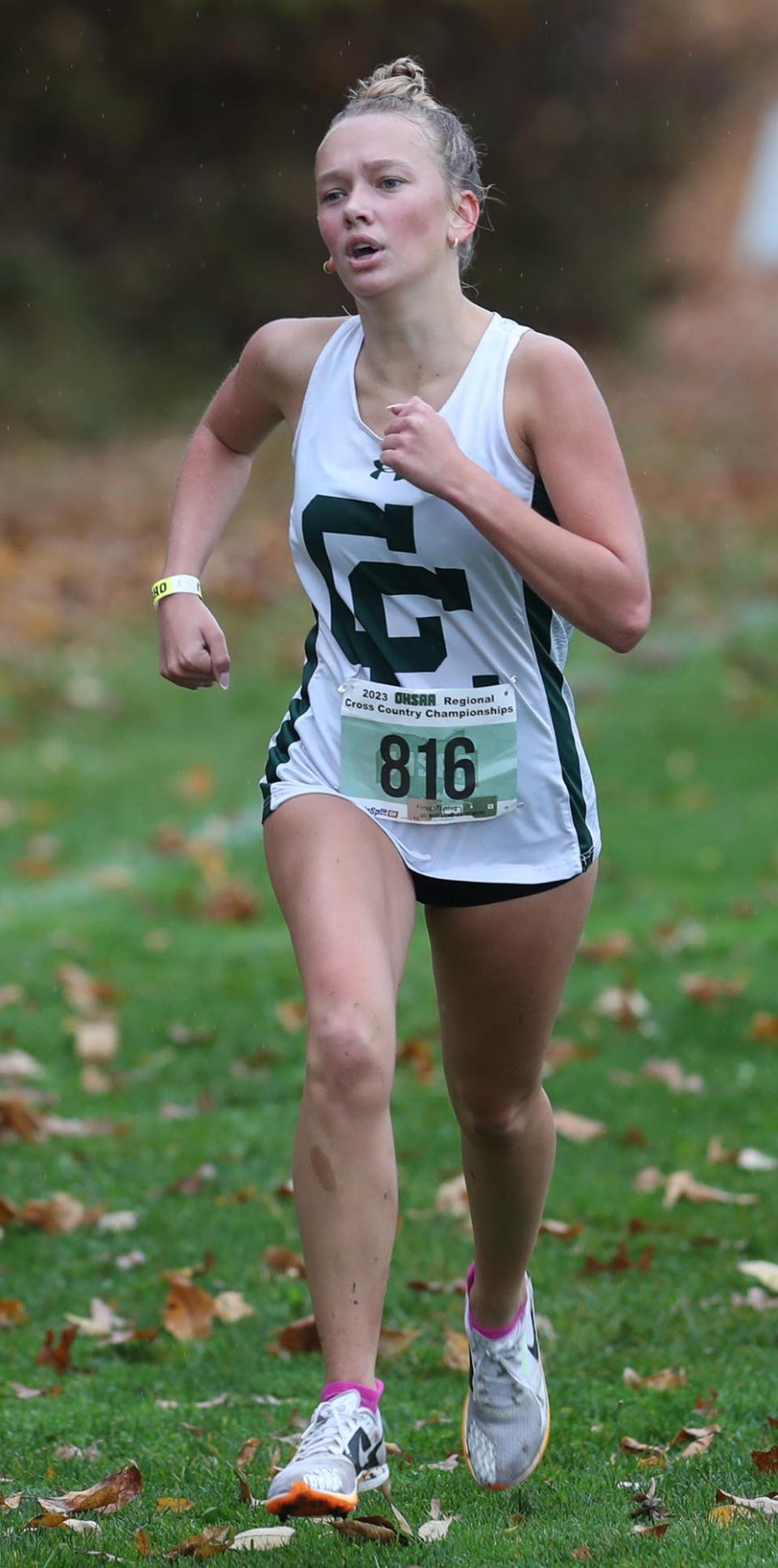 Central Catholic's Allison Ries qualifies for state in the Division III girls race at last week's regional cross country meet in Boardman.