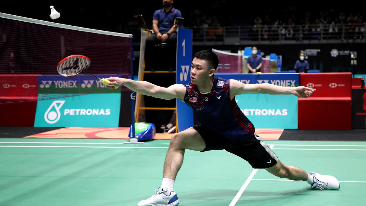 Malaysia shuttler Lee Zii Jia retrieves a shot during his opening-round match at the Malaysia Open. (PHOTO: Wong Fok Loy/SOPA Images/LightRocket via Getty Images)