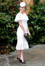 Lady Kitty Spencer in a white lace Dolce & Gabbana dress and a Philip Treacy hat. <em>[Photo: PA]</em>