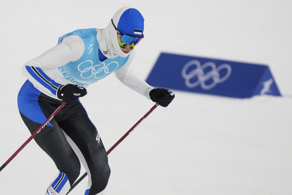 Estonia's Kristjan Ilves competes during the cross-country skiing portion of the individual Gundersen large hill/10km competition at the 2022 Winter Olympics, Tuesday, Feb. 15, 2022, in Zhangjiakou, China. (AP Photo/Aaron Favila)