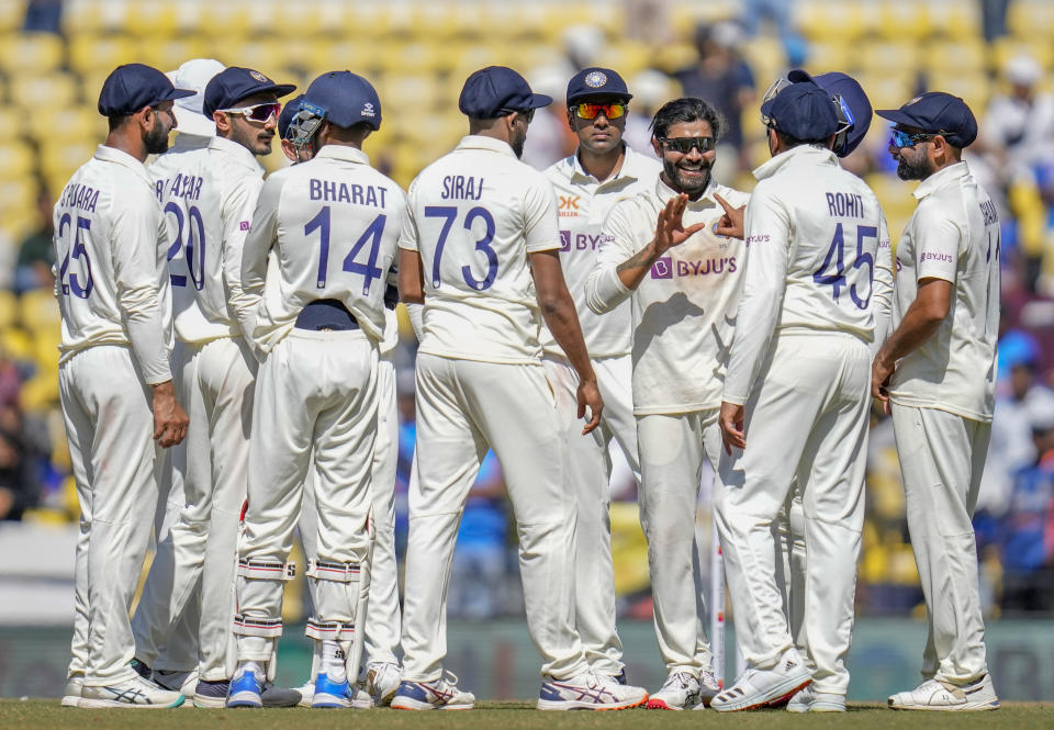 India's Ravindra Jadeja, third right without cap, celebrates with teammates the dismissal of Australia's captain Pat Cummins during the third day of the first cricket test match between India and Australia in Nagpur, India, Saturday, Feb. 11, 2023. (AP Photo/Rafiq Maqbool)