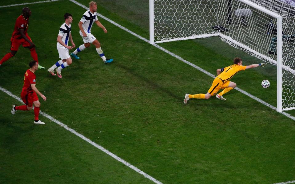 Luckless Finland goalkeeper Lucas Hradecky saw Thomas Vermaelen's header strike the woodwork, rebound to hit him, and go over the line - AFP via Getty Images