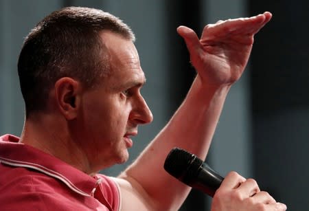 Ukrainian filmmaker Oleg Sentsov speaks during a news conference in Kiev