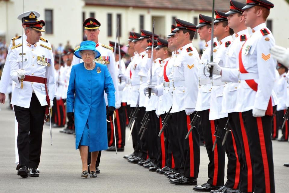 The Queen inspecting the Guard of Honour during the ceremony of presentation of the new colours to the Australian Royal Military College at Duntroon in Canberra, Australia, in 2011 (John Stillwell/PA) (PA Wire)