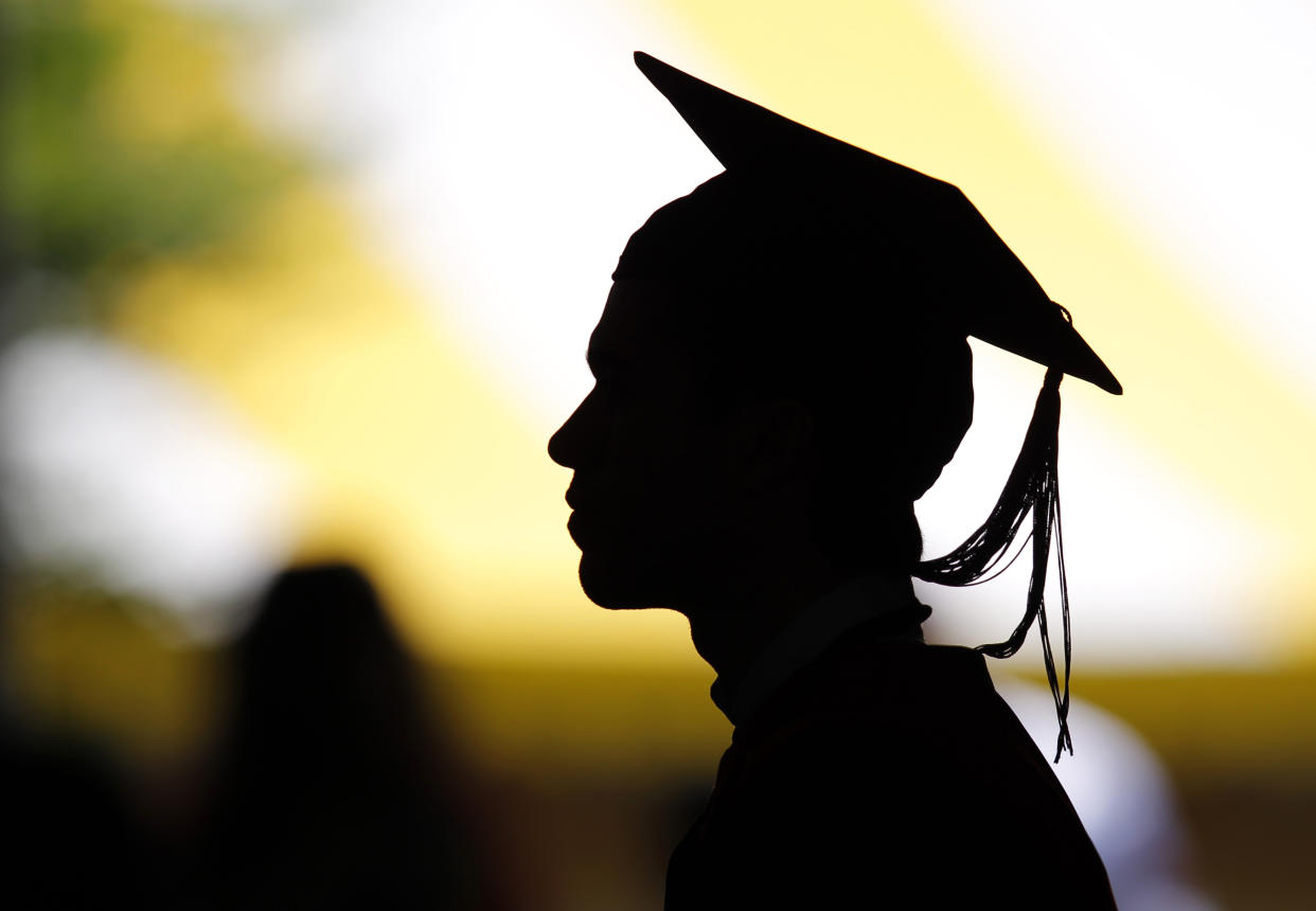 Students take their seats for the diploma ceremony at the John F. Kennedy School of Government during the 361st Commencement Exercises at Harvard University in Cambridge, Massachusetts May 24, 2012.   REUTERS/Brian Snyder    (UNITED STATES - Tags: EDUCATION)