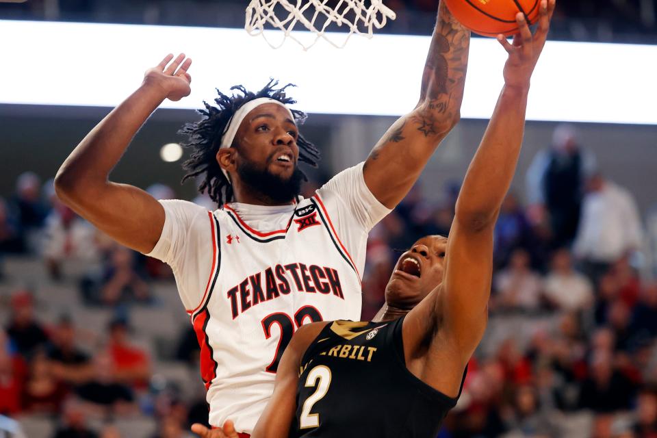 Texas Tech's Warren Washington (22) blocks the shot by Vanderbilt's Ven-Allen Lubin (2) in US LBM Coast-to-Coast Challenge basketball game, Saturday, Dec. 16, 2023, at Dickies Arena in Fort Worth.