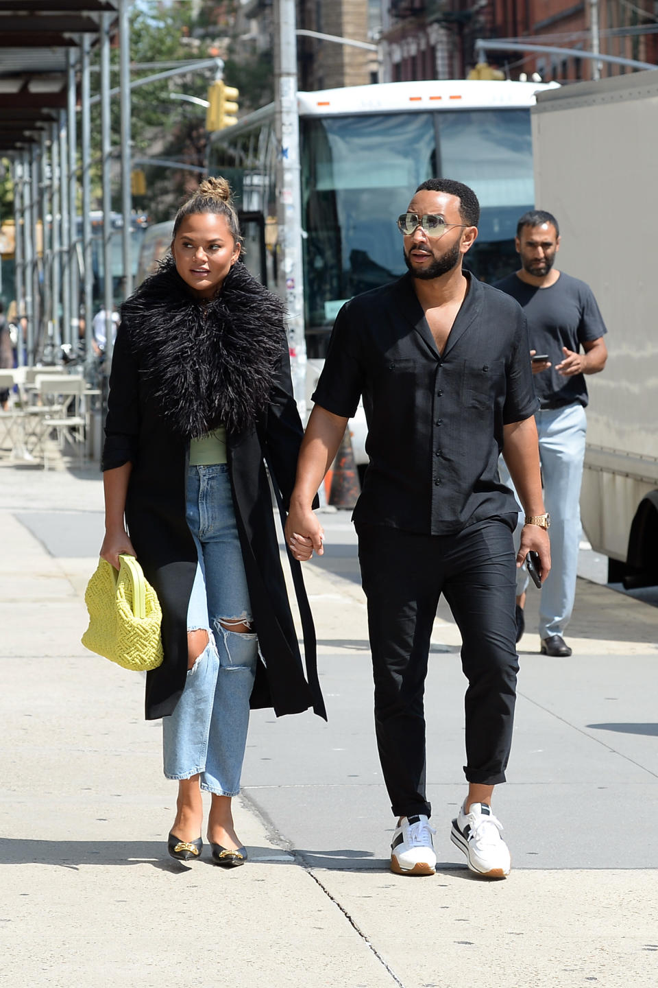 Chrissy Teigen and John Legend walk to a lunch date in New York City. - Credit: Elder Ordonez / SplashNews.com