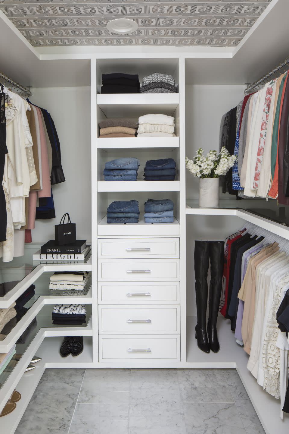 clean white walk in closet