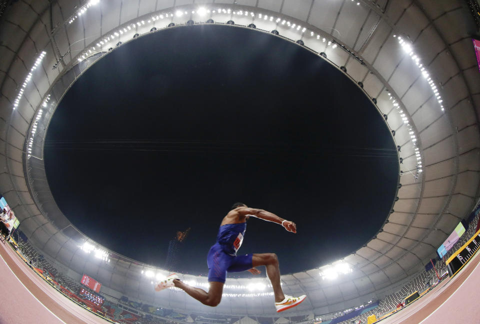 Christian Taylor, of the United States, competes in the men's triple jump final at the World Athletics Championships in Doha, Qatar, Sunday, Sept. 29, 2019. Taylor won the gold medal in the event. (AP Photo/Hassan Ammar)