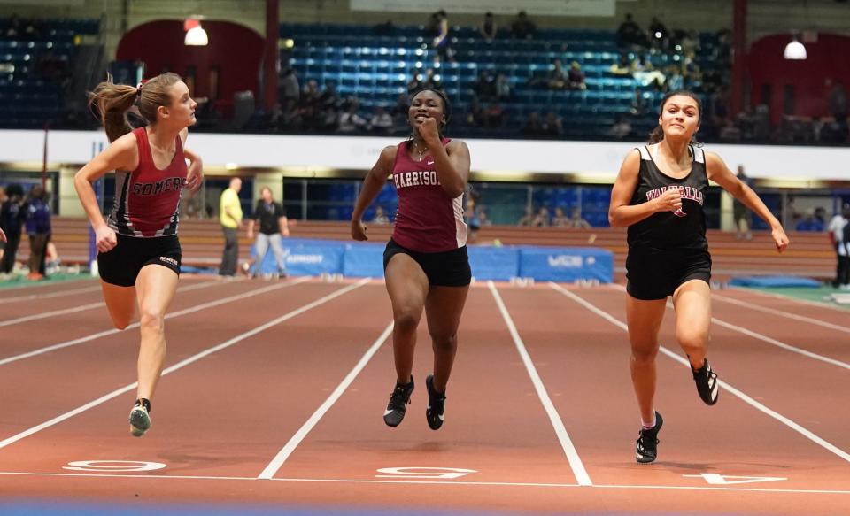 Somers' Haylie Donovan, left, Harrison's Kyangchat Kapio and Valhalla's Juliette Sullivan run the 55-meter dash at the Westchester Co. Track & Field Championships at The Armory. Track & Field Center in New York on Saturday, January 28, 2023.