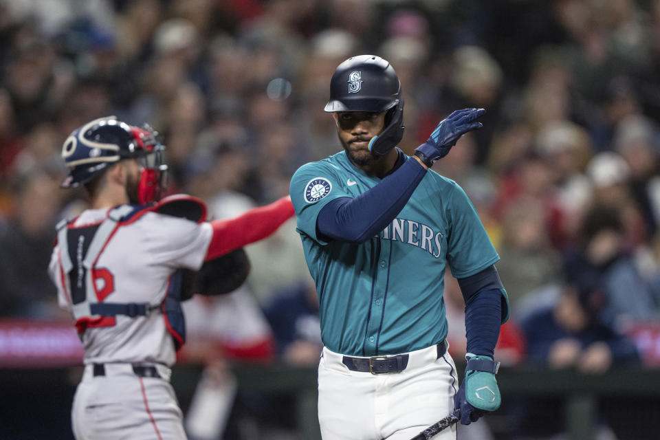 Seattle Mariners' Julio Rodriguez reacts after striking out during the sixth inning of the team's baseball game against the Boston Red Sox, Saturday, March 30, 2024, in Seattle. (AP Photo/Stephen Brashear)