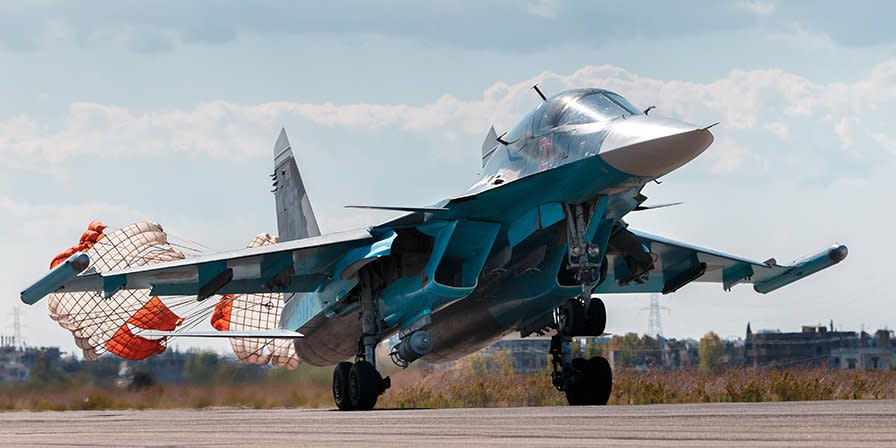 A Russian warplane takes off at Hmeymim air base in Syria