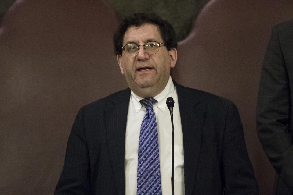 New Light Rabbi Jonathan Perlman prays with Pennsylvania lawmakers who came together in an unusual joint session to commemorate the victims of the Pittsburgh synagogue attack that killed 11 people last year, Wednesday, April 10, 2019, at the state Capitol in Harrisburg, Pa. (AP Photo/Matt Rourke)