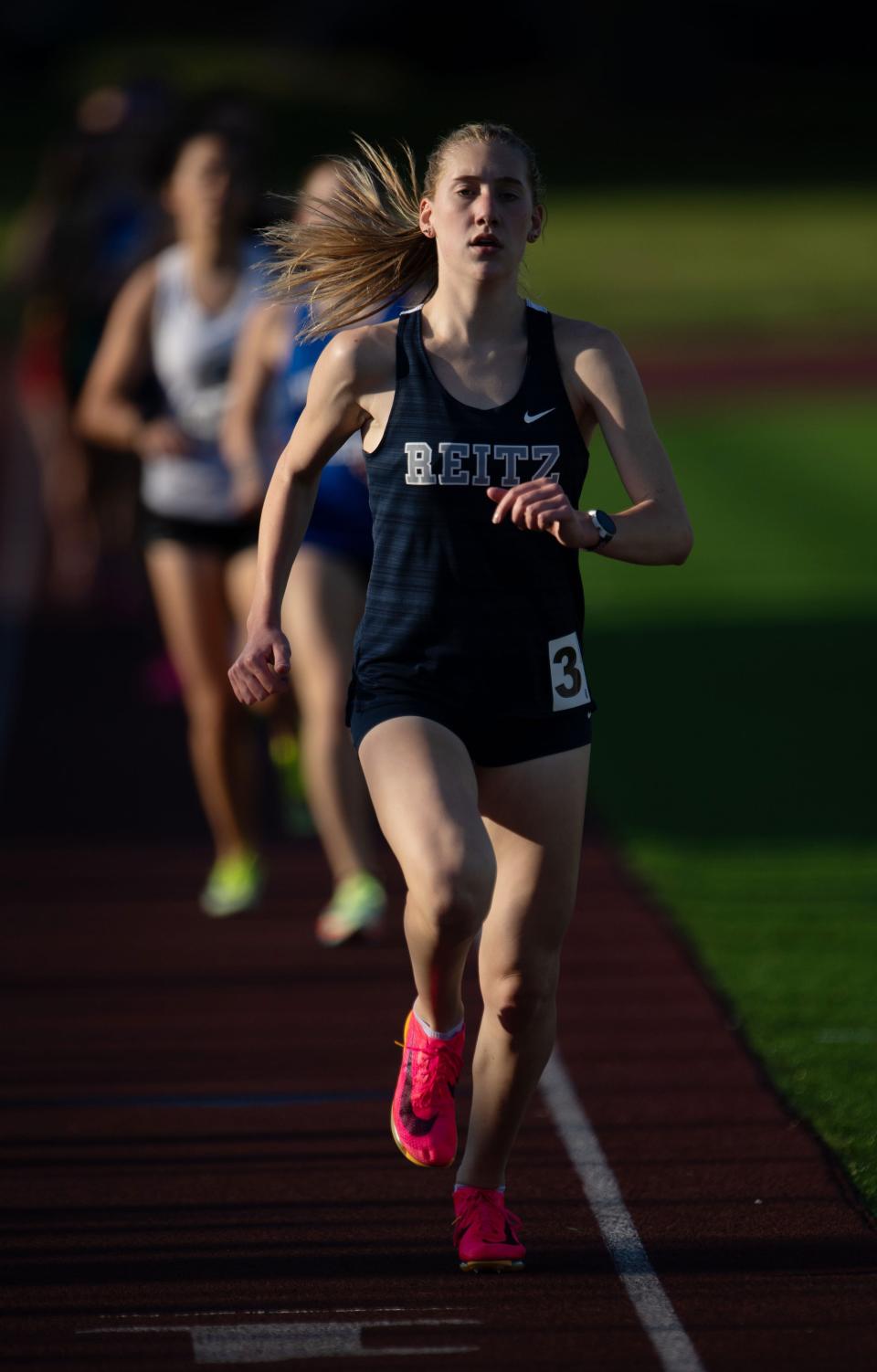 Reitz's Cordelia Hoover takes an early lead and eventually the win in the 1600 meter run with a time of 5:20.43 seconds at the 2023 Boys & Girls City Track & Field Meet at Central High School Monday evening, April 24, 2023.