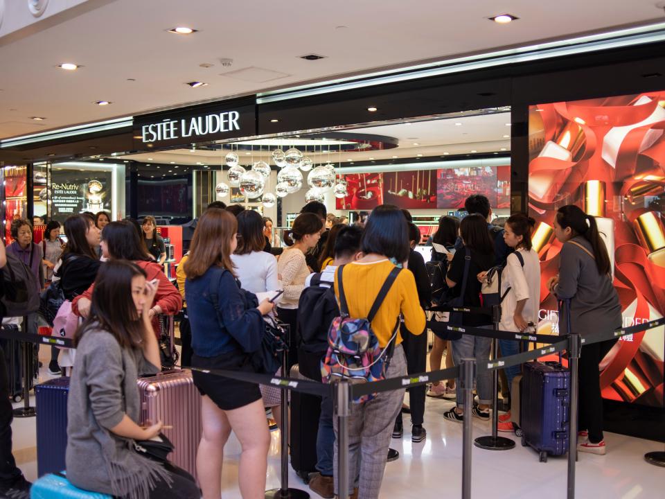 A Line of shoppers is seen outside a Estee Lauder Store in a Shopping Mall in Hong Kong, China. 22 December 2018.