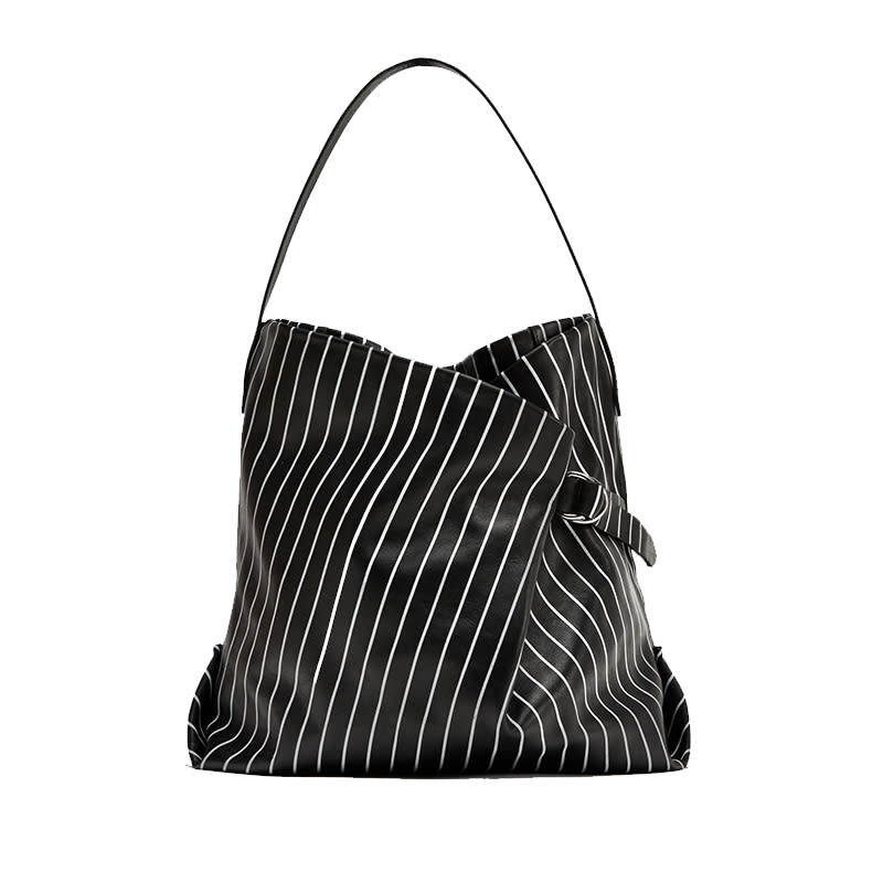 <a rel="nofollow noopener" href="https://www.zara.com/us/en/woman/bags/view-all/striped-print-leather-bucket-bag-c734144p4617502.html" target="_blank" data-ylk="slk:Striped Print Leather Bucket Bag, Zara, $139;elm:context_link;itc:0;sec:content-canvas" class="link ">Striped Print Leather Bucket Bag, Zara, $139</a>