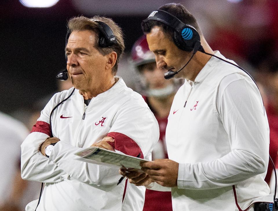 Alabama head coach Nick Saban, left, and offensive coordinator Steve Sarkisian, right, paired to win the 2020 national championship. Saban is famously 25-2 against former assistants; Sarkisian's Texas Longhorns host Alabama in September.