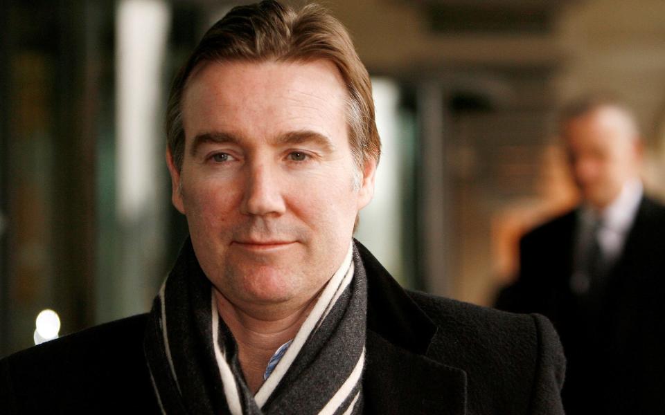 The Chief Executive of Royal Mail, Adam Crozier, leaves after appearing before the Business and Enterprise Committee at Portcullis House, in London February 24, 2009.