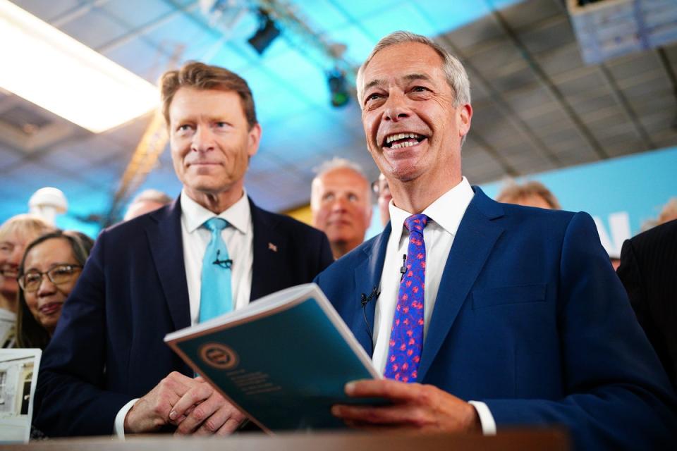 Reform UK chairman Richard Tice (left) and party leader Nigel Farage launch ‘Our Contract with You’ in Merthyr Tydfil on Monday (PA)