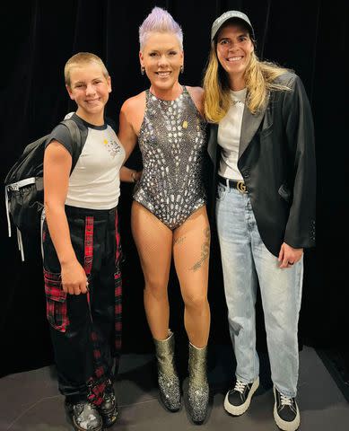 <p>Pink/Instagram</p> Willow and mom Pink posed with Australian soccer player Lydia Williams