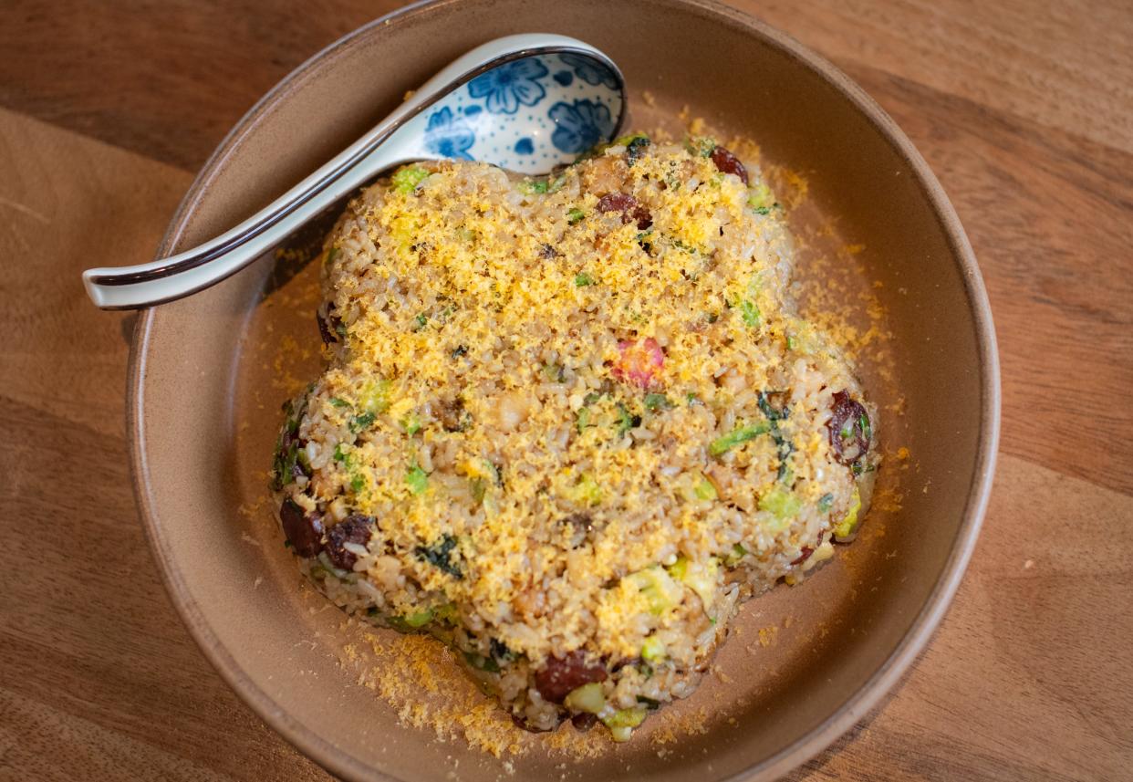 Aromatic Chinese sausage studs a bowl of fried rice at Zoé Tong.