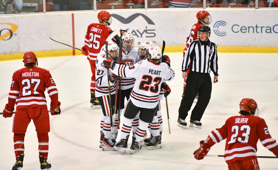 St. Cloud State players celebrate a goal during the first period of the game against Miami Friday, Jan. 21, 2022, at The Herb Brooks National Hockey Center in St Cloud.