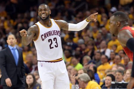 May 4, 2016; Cleveland, OH, USA; Cleveland Cavaliers forward LeBron James (23) calls a play during the second quarter in game two of the second round of the NBA Playoffs at Quicken Loans Arena. Mandatory Credit: Ken Blaze-USA TODAY Sports