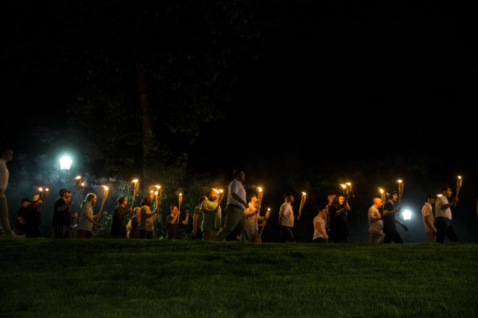 <p>Neo-Nazis, Alt-Right, and White Supremacists march through the University of Virginia Campus with torches in Charlottesville, Va., on Aug. 11, 2017. (Photo: Samuel Corum/Anadolu Agency/Getty Images) </p>