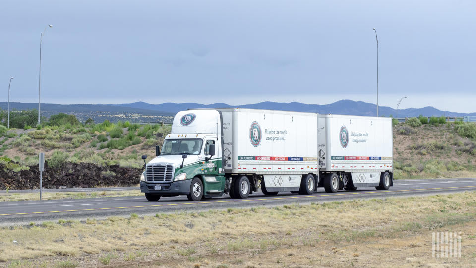 An Old Dominion tractor pulling two LTL trailers on highway