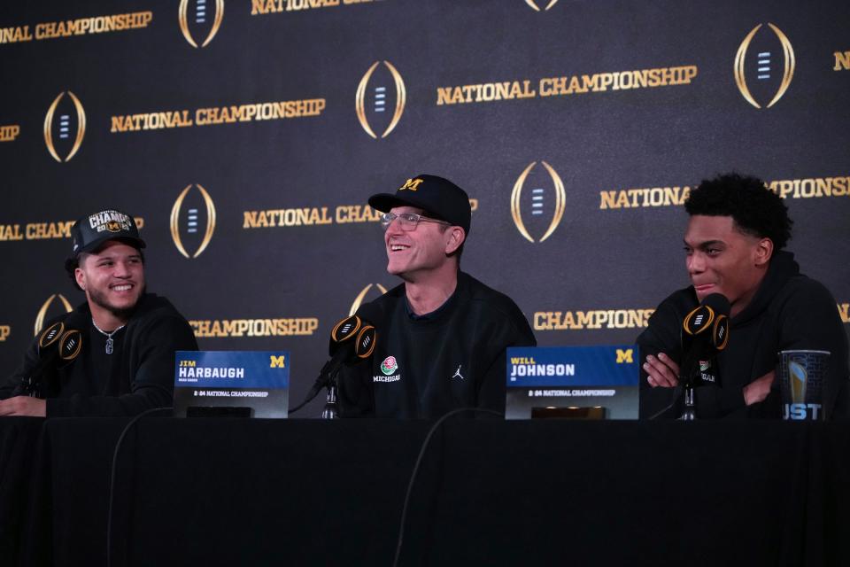 Jan 9, 2024; Houston, TX, USA; Michigan Wolvrines running back Blake Corum (left), coach Jim Harbaugh (center) and cornerback Will Johnson during College Football National Championship press conference at JW Marriot Houston by the Galleria. Mandatory Credit: Kirby Lee-USA TODAY Sports