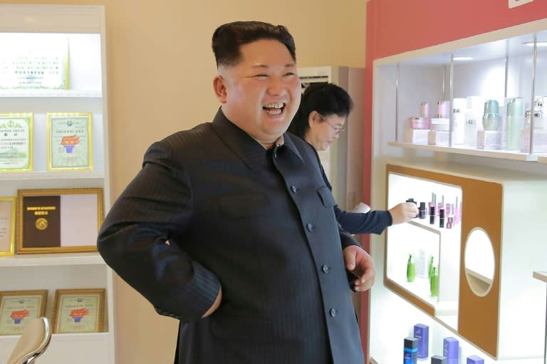 This undated picture released from North Korea's official Korean Central News Agency (KCNA) on October 29, 2017 shows North Korean leader Kim Jong-Un (C) inspecting the Pyongyang Cosmetics Factory