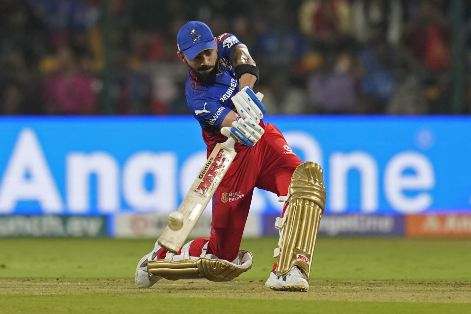 Royal Challengers Bengaluru's Virat Kohli hits a six during the Indian Premier League cricket match between Royal Challengers Bengaluru and Punjab Kings in Bengaluru, India, Monday, March 25, 2024. (AP Photo/Aijaz Rahi)