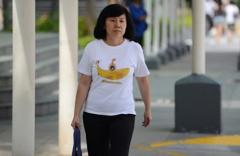 Mary Toh Ai Buay, the mother of teenage blogger Amos Yee, who made online attacks on late former leader Lee Kuan Yew, arrives at the state court to attend her son's hearing in Singapore on July 6, 2015