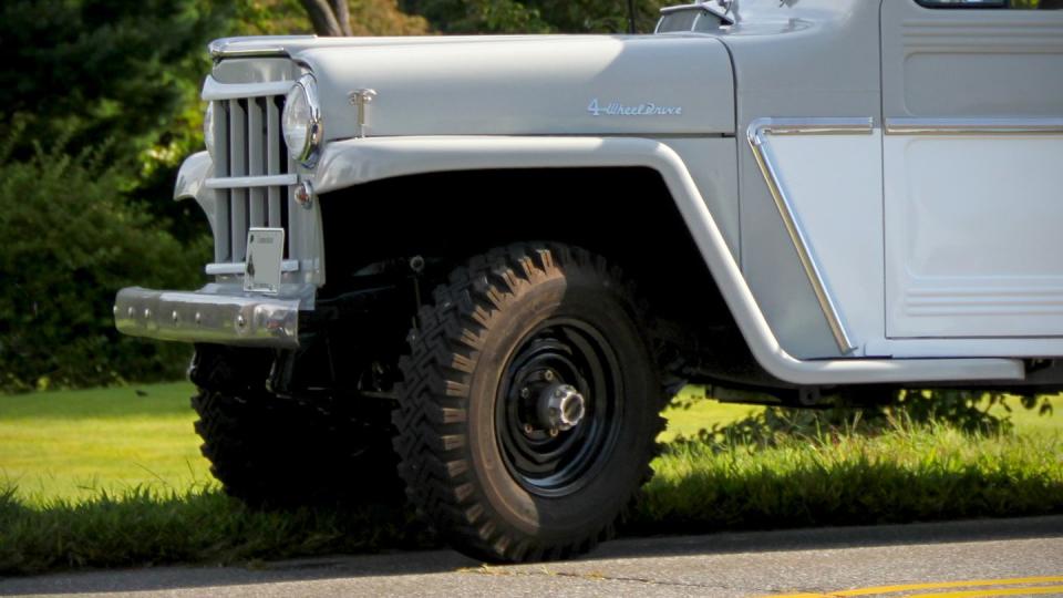 a white truck parked on grass