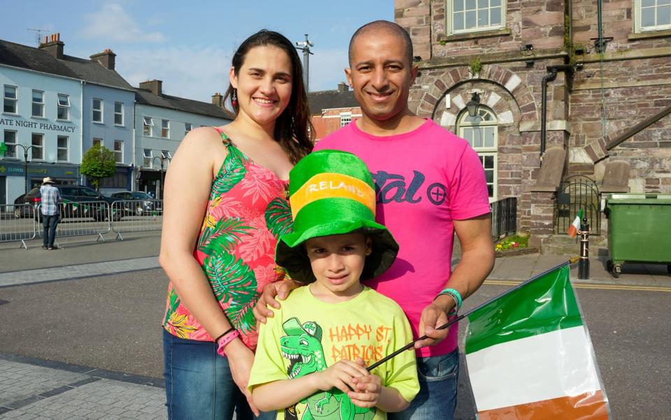 Lececia Giotto, Pedro Alves and their son Rafael Alves attend a watch-along party in the town square of Macroom, hometown of Ireland's Eurovision entrant Bambie Thug