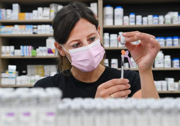 A spokesperson for Health Minister Christine Elliott confirmed a batch of Pfizer doses slated to arrive on Monday have been delayed by two-to-three days.  (Nathan Denette/The Canadian Press - image credit)