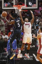 Orlando Magic center Mo Bamba (5) drives to the basket as Miami Heat guard Kyle Lowry (7) defends during the first half of an NBA basketball game, Monday, Oct. 25, 2021, in Miami. (AP Photo/Marta Lavandier)