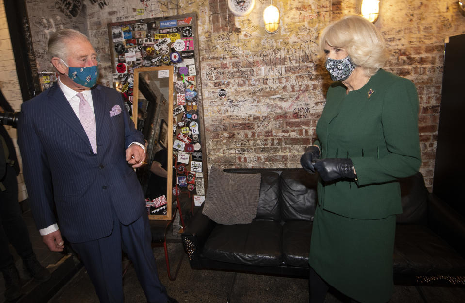 LONDON, ENGLAND - DECEMBER 03: Camilla, Duchess of Cornwall and Prince Charles, Prince of Wales arrive at nightclub during a visit to celebrate London's night economy on December 3, 2020 in London, England. Their Royal Highnesses will be presented to the club's owner and Manager, Mr. Jeff Horton and co-manager, Ms. Ruby Horton. The Prince and The Duchess will meet music and industry professionals, before watching a short musical performance by singer Emily Capell. (Photo by Eddie Mulholland-WPA Pool/Getty Images)