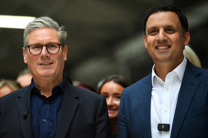 Labour Party leader Keir Starmer (L) and Leader of the Scottish Labour party Anas Sarwar