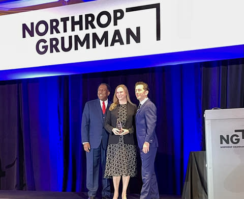 Dynamic Systems, Inc. was awarded Top Small Business by Northrop Grumman. President and CEO, Mardi Norman, accepts the honor on behalf of the company at the 2024 Supplier Excellence Awards Summit in Tysons Corner, VA. Pictured from left to right: Ken Brown, VP Enterprise Global Supply Chain, NGC; Mardi Norman, President and CEO, Dynamic Systems, Inc.; Matt Bromberg, Corporate VP, Global Operations, NGC (Photo: Business Wire)