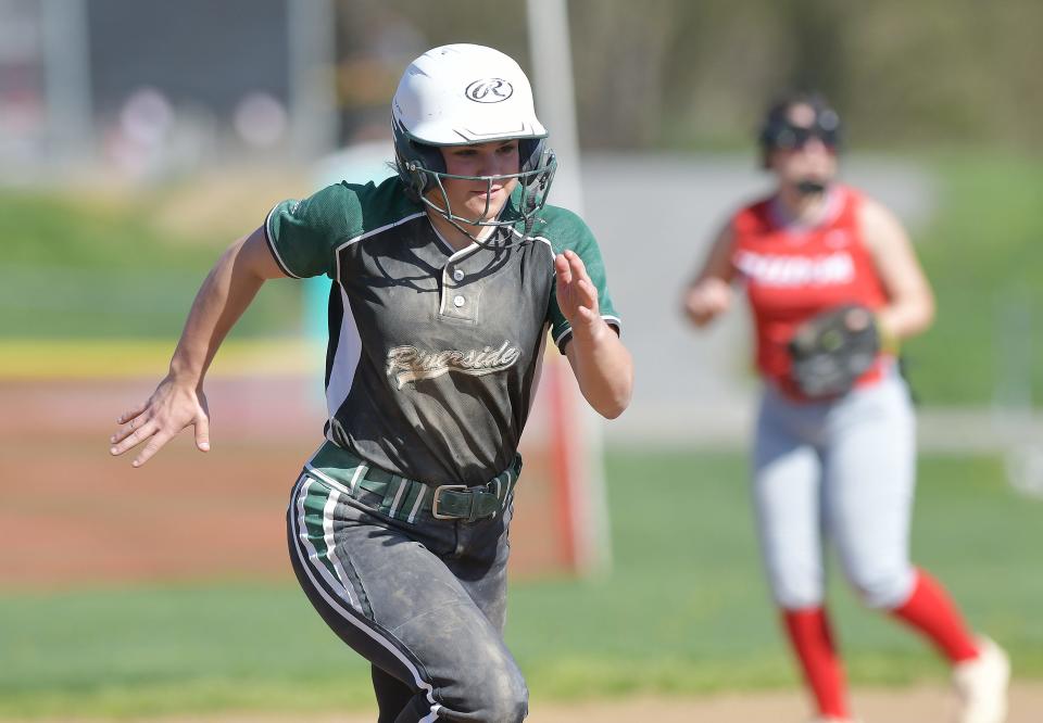 Riverside's Danielle Rosenberger runs to third during Wednesday's game at Freedom Area High School.
Riverside won the game 8-4.