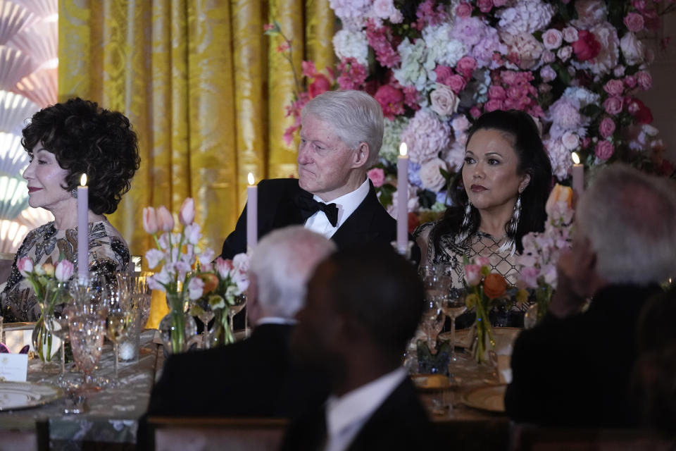 Former President Bill Clinton listens to toast by President Joe Biden and Japanese Prime Minister Fumio Kishida during a State Dinner at the White House, Wednesday, April 10, 2024, in Washington. (AP Photo/Evan Vucci)