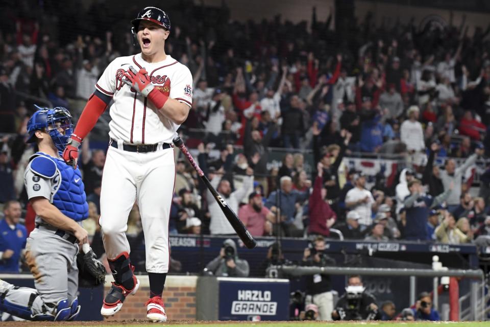 Atlanta's Joc Pederson reacts after hitting a two-run home run during Game 2 of the NLCS.