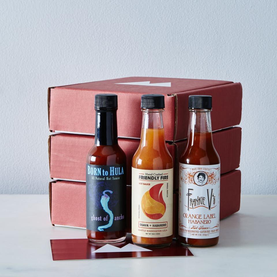 <p>food52.com</p><p><strong>$120.00</strong></p><p>Yes, you read that right: We're suggesting you purchase a hot sauce subscription for your dad. Each box contains three small bottles of quality hot sauce.</p>